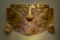 Golden funeral mask of the Peruvian inca culture.