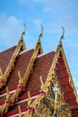 Golden gable apex on the roof of Thai temple, Bangkok.