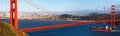 Golden gate bridge and a container ship Royalty Free Stock Photo