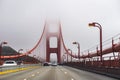 Golden Gate Bridge engulfed by fog and clouds, San Francisco Royalty Free Stock Photo