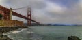 Golden Gate bridge with low fog rolling in San Francisco, California Royalty Free Stock Photo