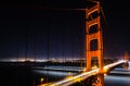 Golden Gate Bridge at night with car and ship trails Royalty Free Stock Photo