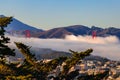 Golden Gate Bridge peeks out from the fog in San Francisco Royalty Free Stock Photo