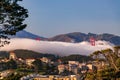 Golden Gate Bridge peeks out from the fog in San Francisco Royalty Free Stock Photo