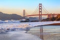 Golden Gate Bridge in San Francisco from Baker Beach at sunset Royalty Free Stock Photo