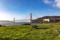 The Golden Gate Bridge in San Francisco over the bay of the Californian city under a blue sky and ocean. Royalty Free Stock Photo