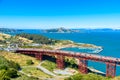 Golden Gate Bridge with the skyline of San Francisco in the background on a beautiful sunny day with blue sky and clouds in summer Royalty Free Stock Photo