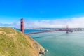 Golden Gate Bridge with the skyline of San Francisco in the background on a beautiful sunny day with blue sky and clouds in summer Royalty Free Stock Photo