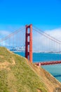 Golden Gate Bridge with the skyline of San Francisco in the background on a beautiful sunny day with blue sky and clouds in summer Royalty Free Stock Photo