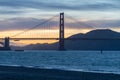 Blue purple orange yellow sunset as seen behind the Golden Gate Bridge