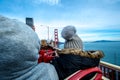 People sit on Big Bus Tour for sightseeing Golden Gate Bridge.