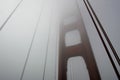 Golden Gate Bridge tower with fog rolling, San Francisco Royalty Free Stock Photo