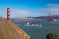 Golden Gate & Cargo ship passing below