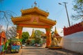 Golden gate by the road. Sagaing, Myanmar