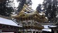 Golden gate Yomeimon in snowy Nikko during winter, Japan.