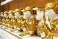 Golden giants on the base wall pagoda Royalty Free Stock Photo