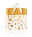 Golden gift bag isolated on white background. Royalty Free Stock Photo