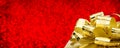 Golden gift box with big bow at red bokeh white blur background, Leave space for adding your content,panoramic banner for