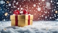 Golden Gift Box, Red Ribbon, and Falling Snowflakes on Christmas Night Royalty Free Stock Photo