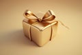 A golden gift box with a ribbon, gold luxury colour, with a ribbon tied around it. Royalty Free Stock Photo