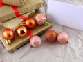 Golden gift box set with red ribbon, christmas balls and empty card Royalty Free Stock Photo