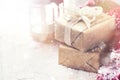 Golden gift boxes with beautiful ribbon and bow on a bright shin Royalty Free Stock Photo