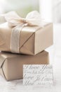 Golden gift boxes with beautiful ribbon and bow on a bright shiny background Royalty Free Stock Photo