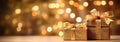 Golden gift boxes with ribbon bow tag over blurred bokeh background with lights. Birthday or Christmas decor. Blinking Royalty Free Stock Photo