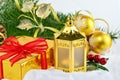 Golden gift with red bow and ribbon