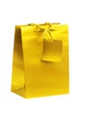 Golden gift shopping bag isolated on white Royalty Free Stock Photo