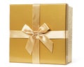 Golden Gift with Silk Bow. Gold Christmas Present with Satin Ribbon over isolated White Background. Close up of Glossy Yellow Royalty Free Stock Photo