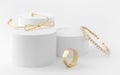 Golden girl accessories two golden bracelets and ring on white background Royalty Free Stock Photo