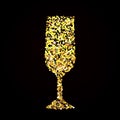 Golden glass with champagne. A black background.