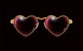Golden glasses with a rim of hearts, isolated in black background. Eyeglasses obligatory Attribute of Valentines day. Retro design