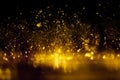 Golden glitter bokeh lighting texture Blurred abstract background for birthday, anniversary, wedding, new year eve or Christmas Royalty Free Stock Photo