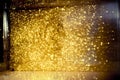 Golden glitter bokeh lighting texture Blurred abstract background for birthday, anniversary, wedding, new year eve or Christmas Royalty Free Stock Photo