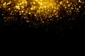 Golden glitter bokeh lighting texture Blurred abstract background for birthday, anniversary, wedding, new year eve or Christmas Royalty Free Stock Photo