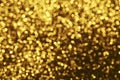 Golden glitter bokeh lighting texture Blurred abstract background for birthday, anniversary, wedding, new year eve or Christmas Royalty Free Stock Photo