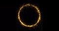 Golden glitter circle of sparkling light shine. Gold glittering ring, magic shimmer glow, bright light sparks bokeh effect