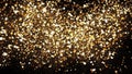 Golden glitter dust on black background. Sparkling splash intro with gold powder. Bokeh glowing magic mist effect