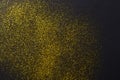 Golden glitter sand texture, abstract background. Royalty Free Stock Photo