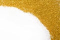 Golden glitter sand texture frame on white, abstract background. Royalty Free Stock Photo