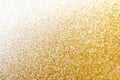 Golden glitter sand texture on white, abstract background. Royalty Free Stock Photo