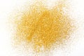 Golden glitter sand texture on white, abstract background. Royalty Free Stock Photo