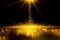 Golden glitter spatter are bokeh lighting texture blurred abstract background for anniversary celebration Royalty Free Stock Photo