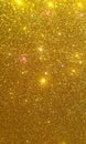 Golden glitter textured background,Bright beautiful shining golden glitter. Royalty Free Stock Photo