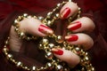 Golden glittered red nails