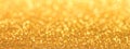 Golden glittering background. Sparkle glitter texture with the bokeh and the lights Royalty Free Stock Photo