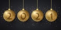 Golden glittering hanging Christmas balls with numbers 2021 New Year. Grunge brush. Festive background for greeting card or poster Royalty Free Stock Photo