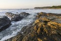 Golden glow on Playa Pelada Rocks Royalty Free Stock Photo